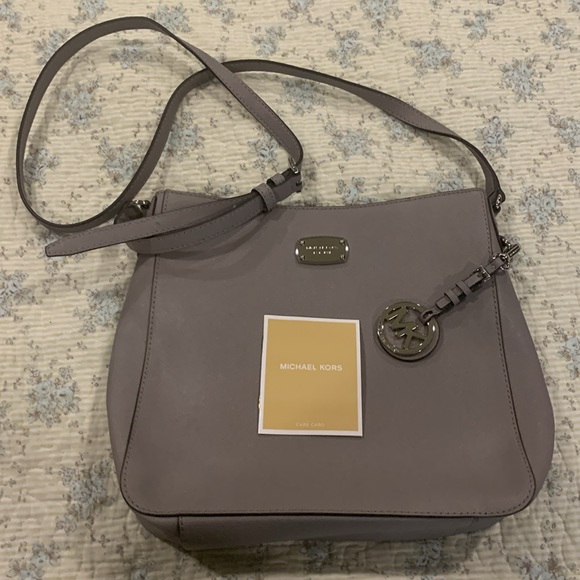 Michael Kors Handbags - Michael Kors Crossbody Messenger Bag NWOT Gray Saffiano leather phone pocket+